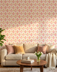 Rose Honeycomb blush geometric peel and stick wallpaper as a feature wall in a bright home office