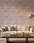 Rose Resist textured mauve abstract wallpaper in a warm and inviting living room