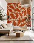 Self-adhesive wall covering featuring an abstract, organic leaf motif in terracotta and beige shades (Rust Echoes)