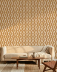 Saffron Ikat ochre geometric peel and stick wallpaper in a warm and inviting living room