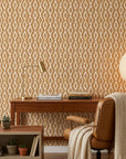 Saffron Ikat ochre geometric peel and stick wallpaper as a feature wall in a bright home office