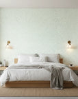 Sage Drop sage green polka dot wallpaper adding character to a cozy bedroom