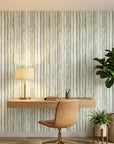 Sage Rainfall neutral toned vertical stripe wallpaper as a feature wall in a bright home office