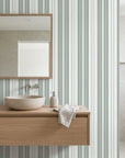Sage Stripe modern grey striped wallpaper creating ambiance in a serene bathroom