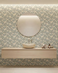 Sage & Gold elegant botanical peel and stick wallpaper creating ambiance in a serene bathroom