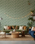 Sage Silhouette sage green botanical leaf wallpaper in a warm and inviting living room