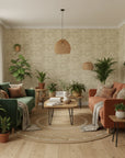 Sage Undergrowth olive green botanical grass wallpaper in a warm and inviting living room