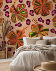 Vibrant tropical hibiscus flowers paired with leopard print on removable wallpaper