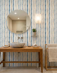 Seashore Dot blue and beige striped wallpaper creating ambiance in a serene bathroom