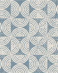 Subtle blue-hued, textured wallpaper featuring a custom minimalist design wallcovering