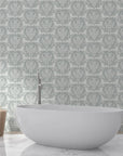 Silver and grey Serene Blossom damask wallpaper in elegant bathroom with freestanding tub