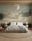 Shaded Grove cloud mural wallpaper in sage green and cream tones on modern bedroom accent wall
