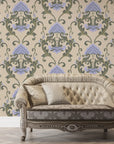 Shaded Meadow Muse removable wallpaper with lavender damask florals on vintage champagne background behind tufted sofa