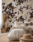 Peel and stick removable wallpaper featuring a distressed botanical shadow pattern in black and brown colors, from the Shadow Luxe line