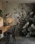Monochromatic Shadow Meadow wallpaper with layered botanical silhouettes in charcoal and cream tones on dining room wall