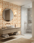 Sienna Drift warm terracotta autumn leaf wallpaper creating ambiance in a serene bathroom