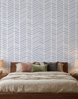 Silver Chevron pale blue geometric wallpaper adding character to a cozy bedroom