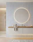 Silver Chevron pale blue geometric wallpaper creating ambiance in a serene bathroom
