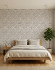 Silver Eddy soft grey abstract swirl wallpaper adding character to a cozy bedroom