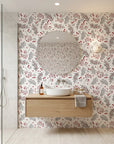 Silver & Berry modern red botanical wallpaper creating ambiance in a serene bathroom