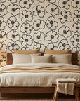 Sketch Anemone artistic floral wallpaper adding character to a cozy bedroom
