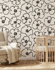 Sketch Anemone artistic floral wallpaper as a feature wall in a bright home office