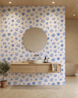 Sketched Seashells serene blue seashell wallpaper creating ambiance in a serene bathroom