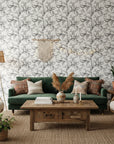 Sketched Silence black and white line art leaf wallpaper in a warm and inviting living room