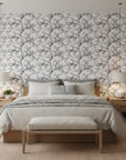 Sketched Silence black and white line art leaf wallpaper adding character to a cozy bedroom