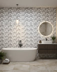Sketched Silence black and white line art leaf wallpaper creating ambiance in a serene bathroom
