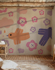 Whimsical bird wallpaper used in a nursery or toddler room, showing pastel birds and flowers that bring a joyful, comforting mood to the interior.