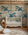 Blue-themed aquatic wallpaper; a striped pattern punctuated by playful, winking sharks.