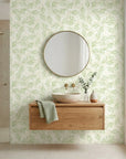 Soft Canopy serene green botanical wallpaper creating ambiance in a serene bathroom
