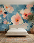 Soft Scatter floral wallpaper with oversized peach blooms and teal leaves on bedroom accent wall
