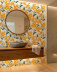 Solar Bloom bright floral wallpaper creating ambiance in a serene bathroom