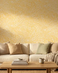 Solar Drift organic yellow wallpaper in a warm and inviting living room