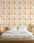 Solar Ritual peach and beige floral wallpaper adding character to a cozy bedroom