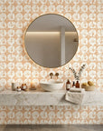 Solar Ritual peach and beige floral wallpaper creating ambiance in a serene bathroom