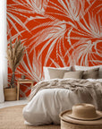 Solar Fronds wallpaper, featuring a white tropical palm print on a bold orange background