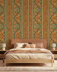 Spice Bazaar ornate orange and teal damask wallpaper in a warm and inviting living room