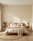 Spun Gold golden sun spiral wallpaper adding character to a cozy bedroom