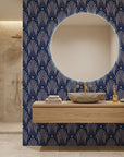 Starlit Swirl vibrant navy and gold dot pattern wallpaper as a feature wall in a bright home office