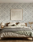 Still Labyrinth grey geometric peel and stick wallpaper adding character to a cozy bedroom