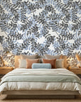 Still Morning blue and grey botanical wallpaper adding character to a cozy bedroom