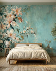 Peach lily and cherry blossom Still & White wallpaper on turquoise textured bedroom accent wall