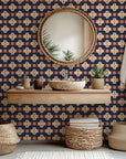 Red and navy self-adhesive wallpaper featuring a Southwestern geometric motif, known as Stitched Summit