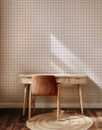 Self-adhesive pink and white geometric wallpaper featuring a circular lattice pattern