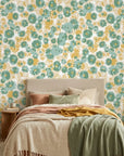 Sunlit Field muted floral peel and stick wallpaper adding character to a cozy bedroom