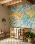 Sun-dappled wall covering with vibrant paint strokes and blooms