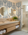 Sunlit Thicket blue floral damask wallpaper creating ambiance in a serene bathroom